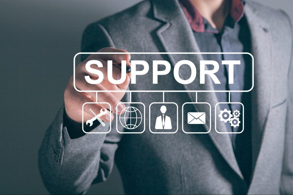Business professional presenting managed IT support and business technology services for UK companies